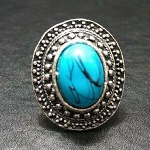 Silver tone and blue ring